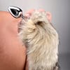 Model Holding Metal Fox Tail Anal Plug