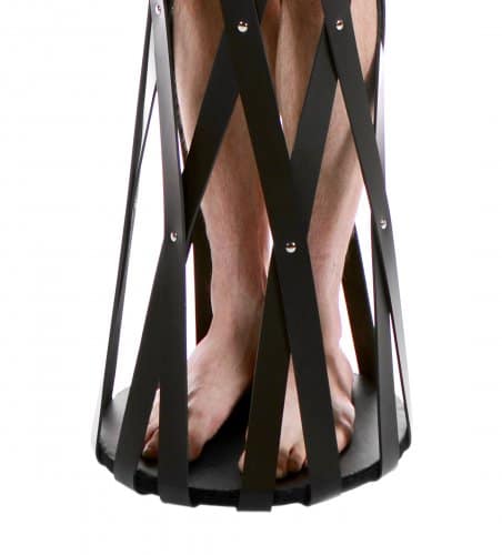 Hanging Rubber Cage With Close Up Of Feet