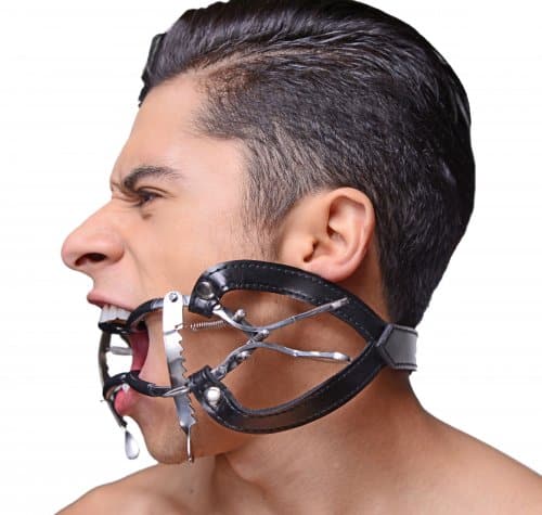 Ratchet Style Strapped Mouth Gag With Male Model Side View