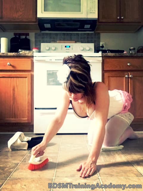 Slave Cleaning Floor